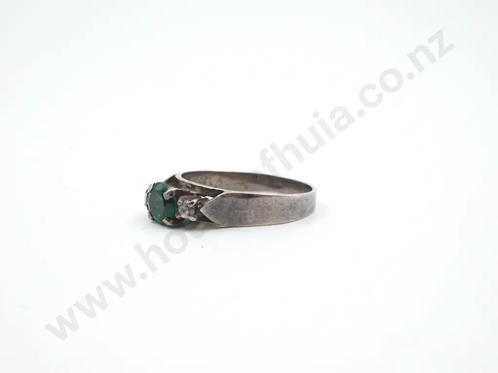 Four Sterling Silver Rings set with Green Gems Image 1++
