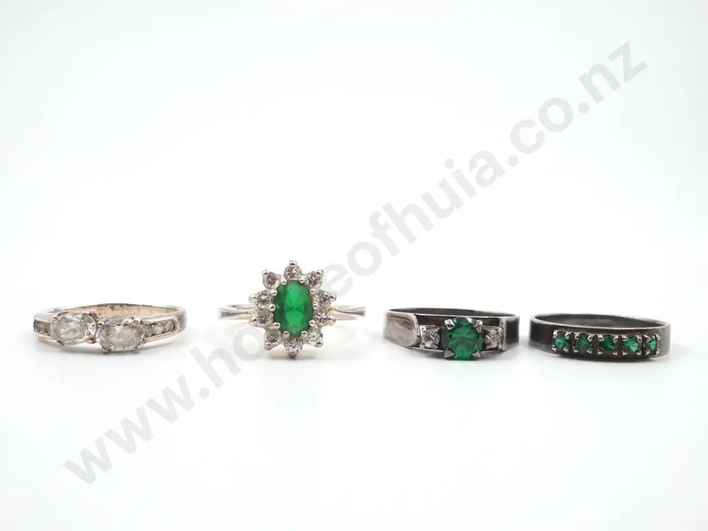 Four Sterling Silver Rings set with Green Gems Image 1++
