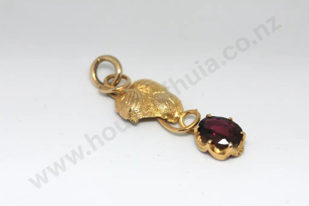Leaf Pendant with Garnet Stone in 15 Yellow Gold Image 1++