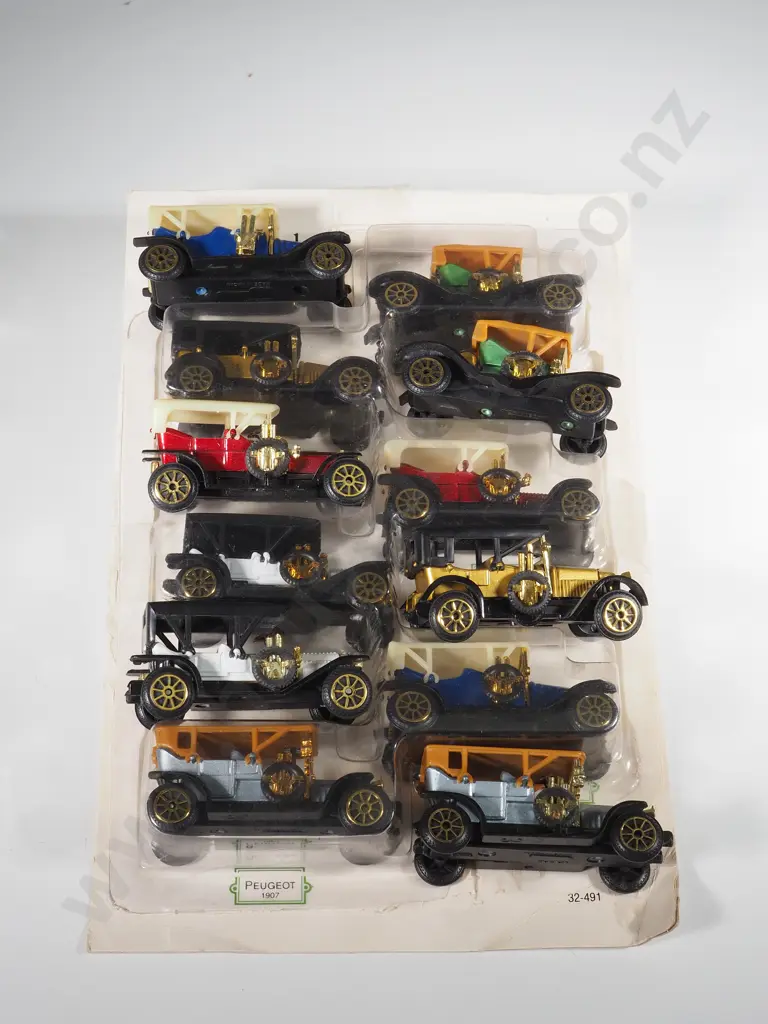 Twelve Vintage Car Models - 6 Boxed and Titled Image 1++
