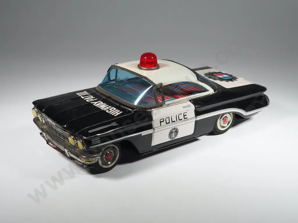 Oldsmobile Toy Police car, Made in Japan Image 1++