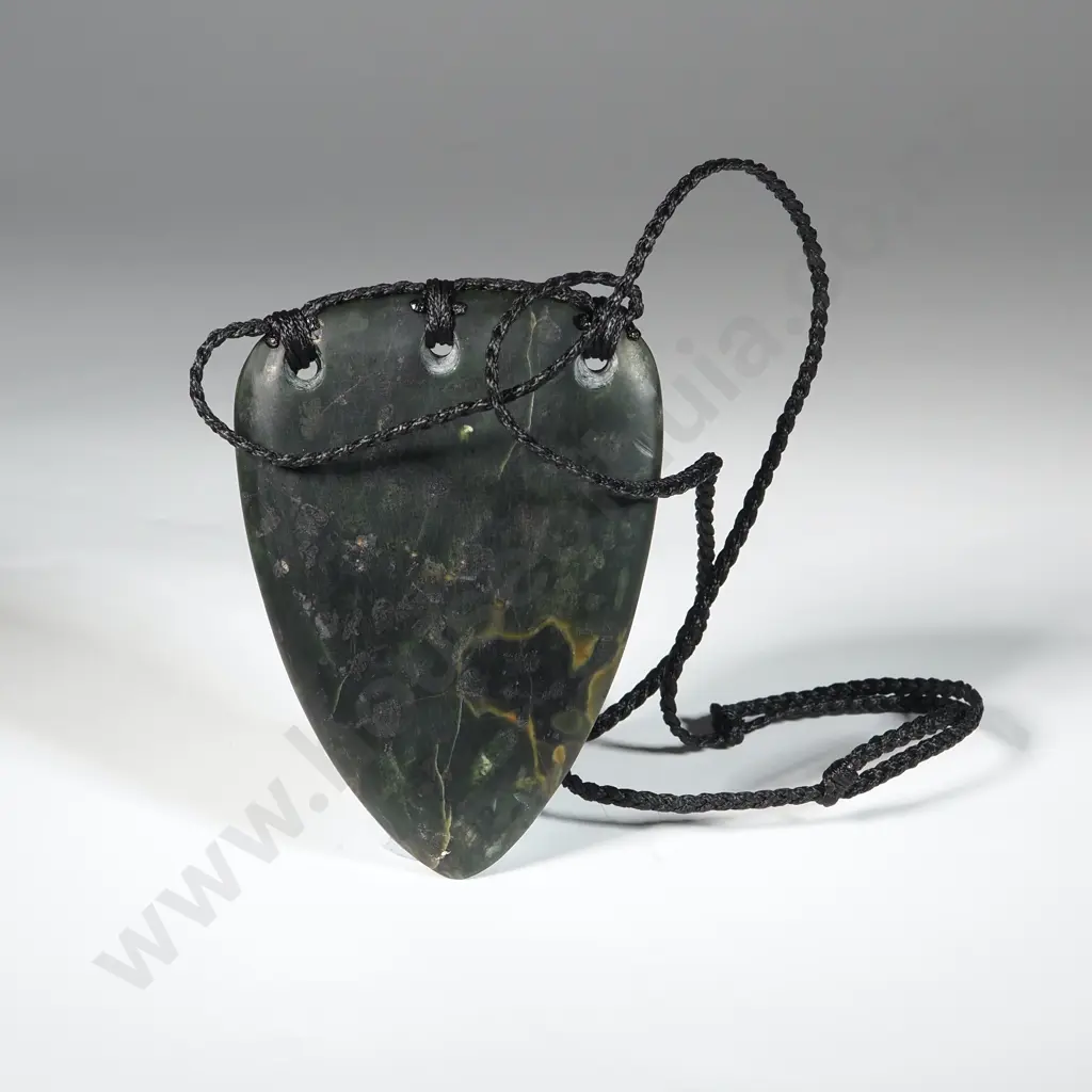 Pounamu Breastplate With Whakiro Designs. Image 1++