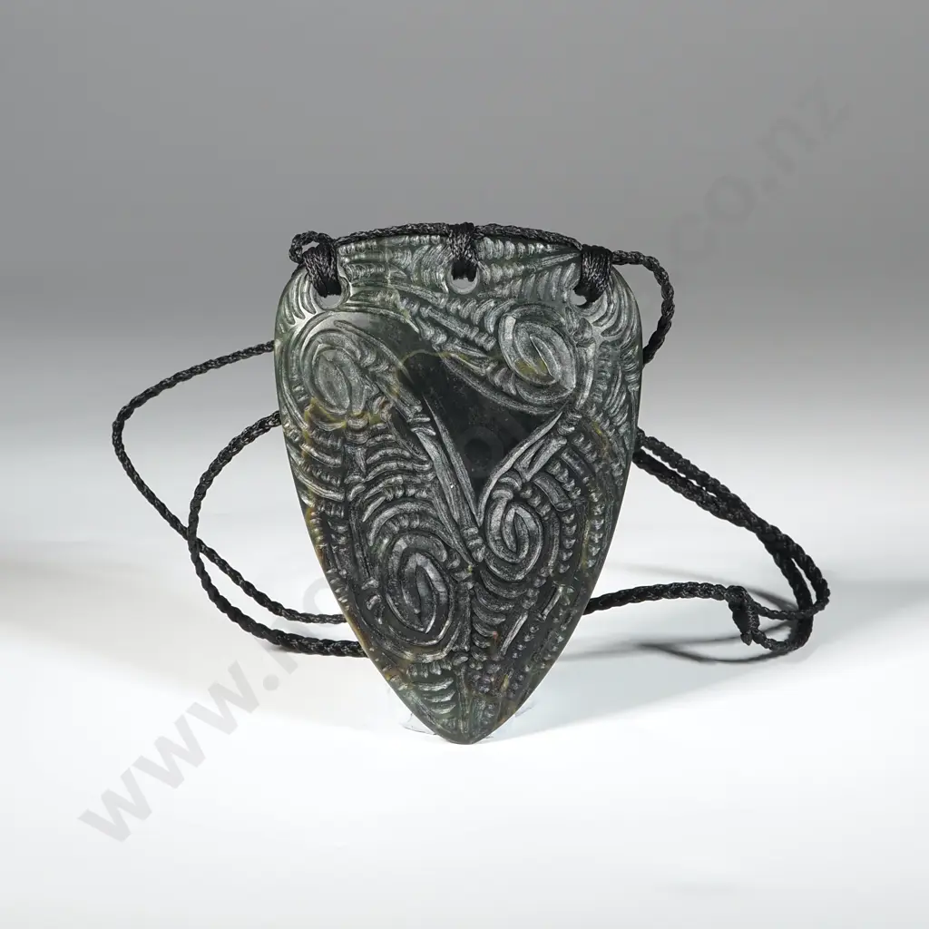 Pounamu Breastplate With Whakiro Designs. Image 1++