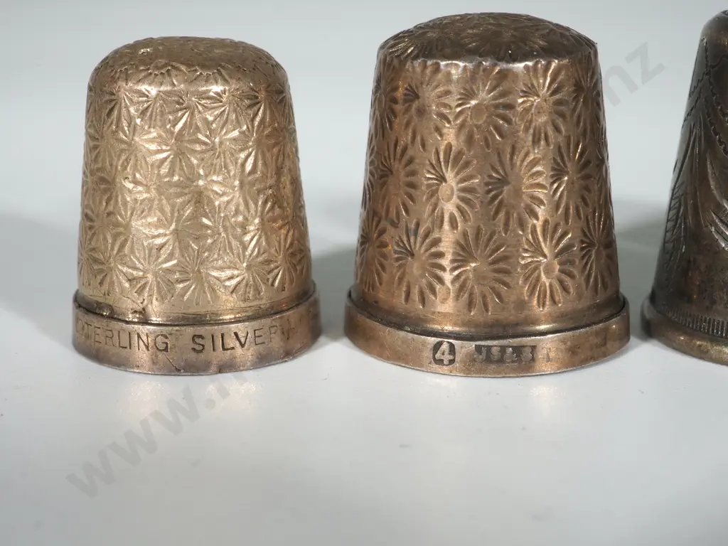 Collection of Four Sterling Silver Thimbles Image 1++