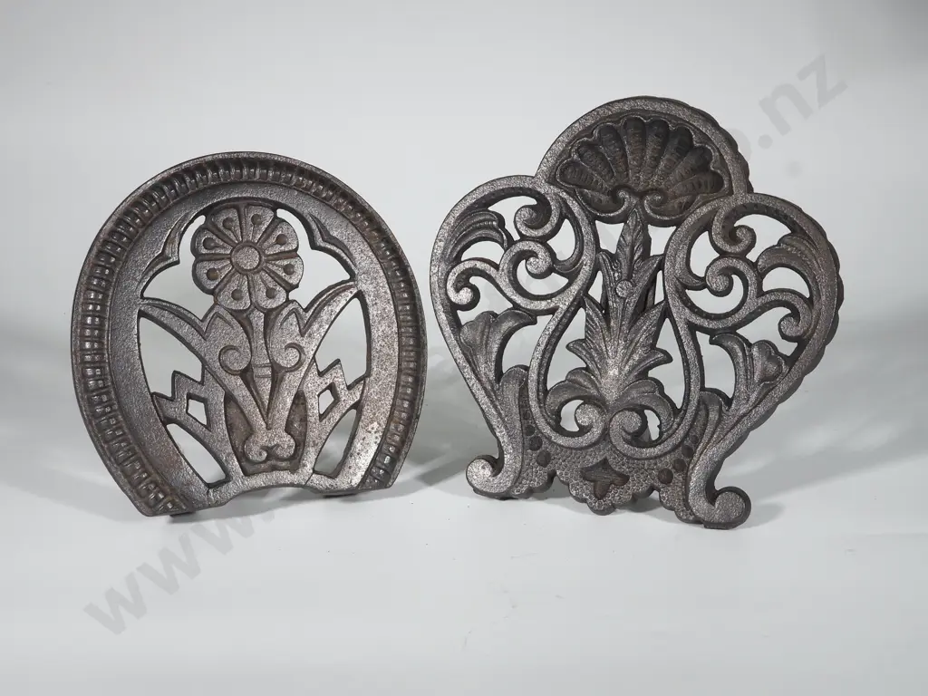 Two Cast Iron Trivets with Floreat Motifs Image 1++