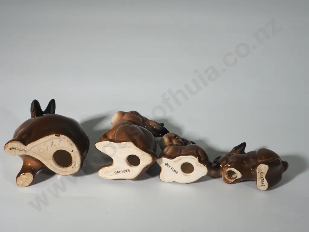 Set of Four Brown China Bunnies Image 1++