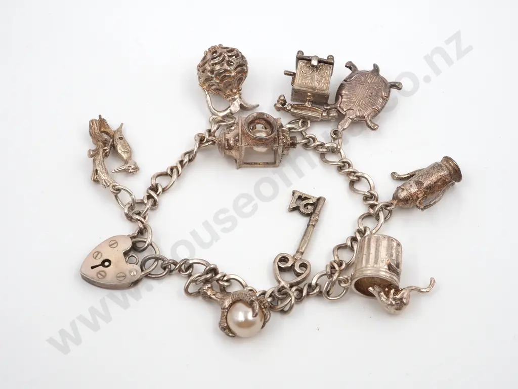 Sterling Silver Charm Bracelet w 9 Charms Image 1++