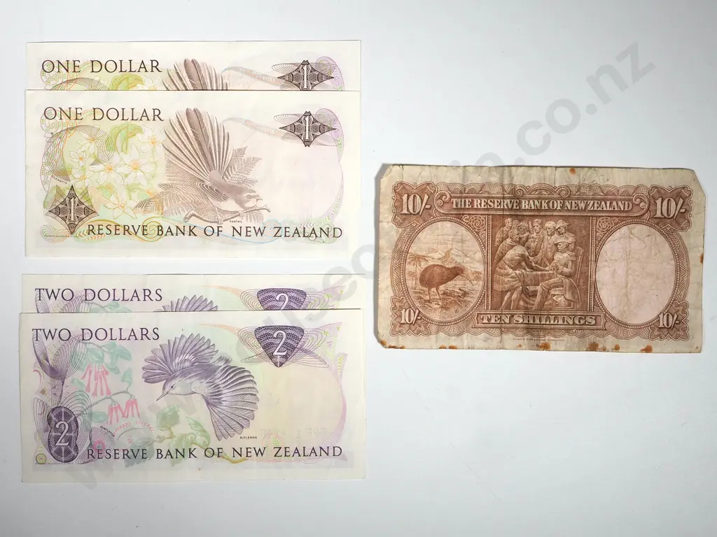 Mixed Lot of New Zealand Paper Currency: One Ten Shilling; Two $1 Dollars; Two $2 dollars Image 1++