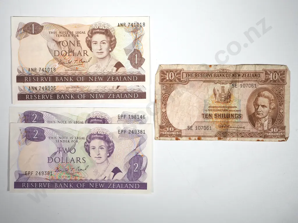 Mixed Lot of New Zealand Paper Currency: One Ten Shilling; Two $1 Dollars; Two $2 dollars Image 1++