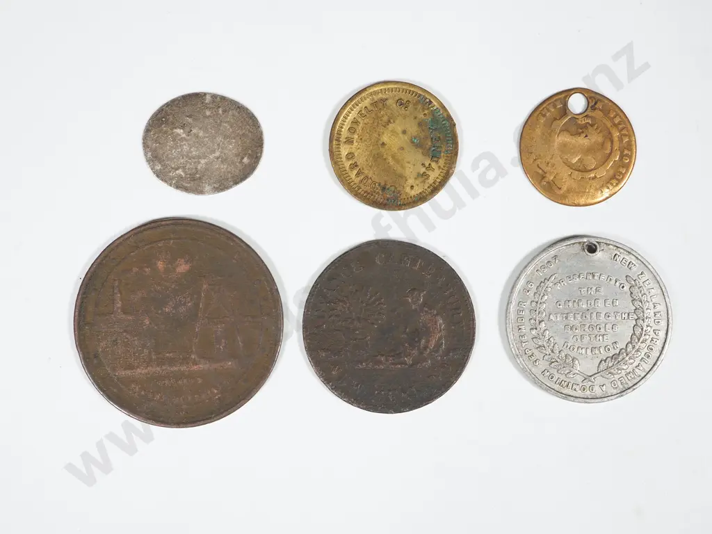 Six Assorted Antique Tokens including New Zealand Image 1++