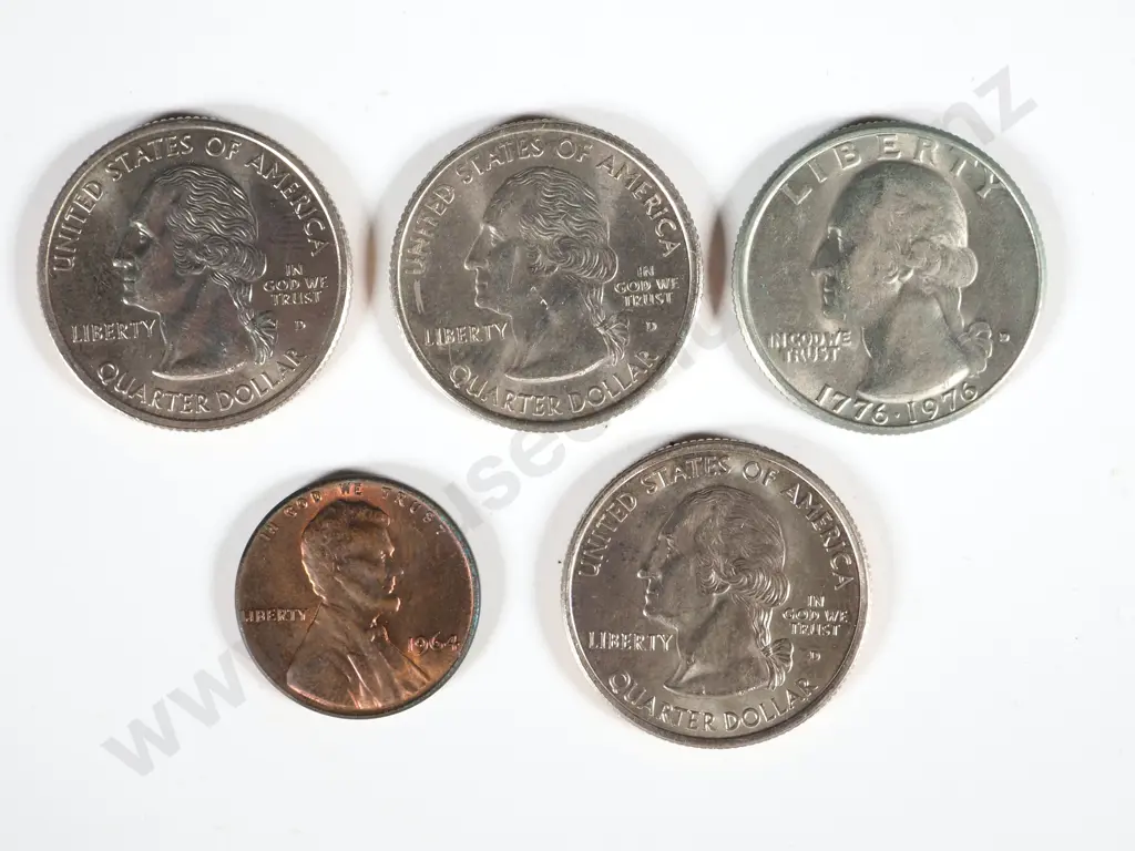 Four US State Quarters; One US Cent Image 1++