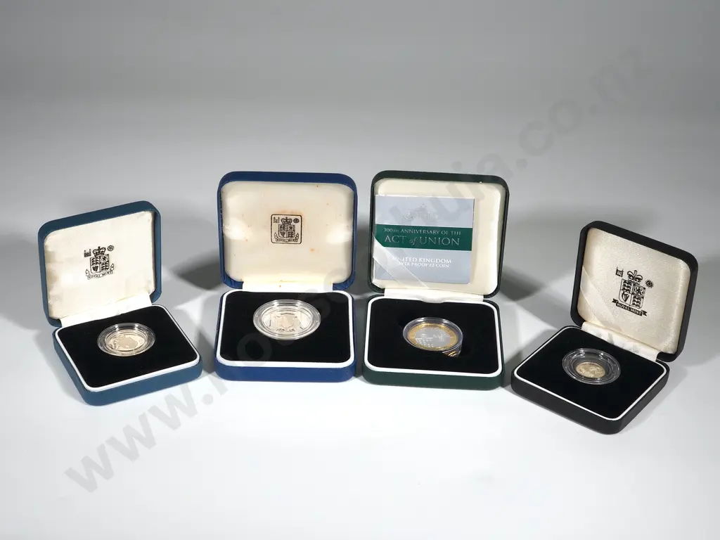 Great Britain:  8 Cased Proof Sterling Silver Coins with COA’s Image 1++