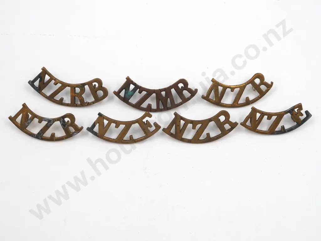 Assorted lot of Seven New Zealand Brass Shoulder Titles Image 1++