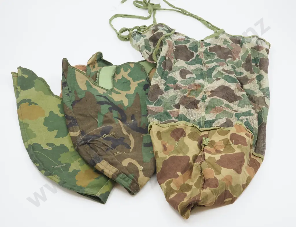 Three Different ANZAC Post War Helmet Covers Image 1++