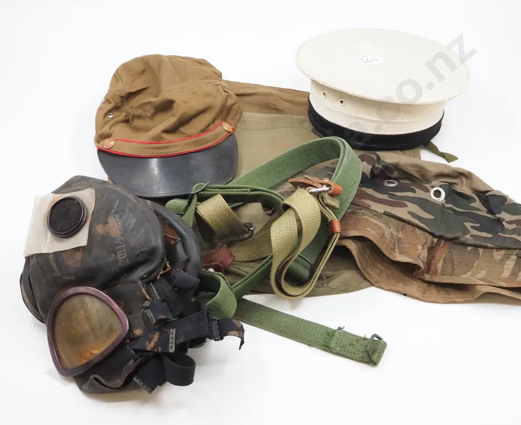 Assorted Lot of Military Equipment: Gas Mask / Rifle Slings / Hat / Two US Personal Effects Bags Image 1++