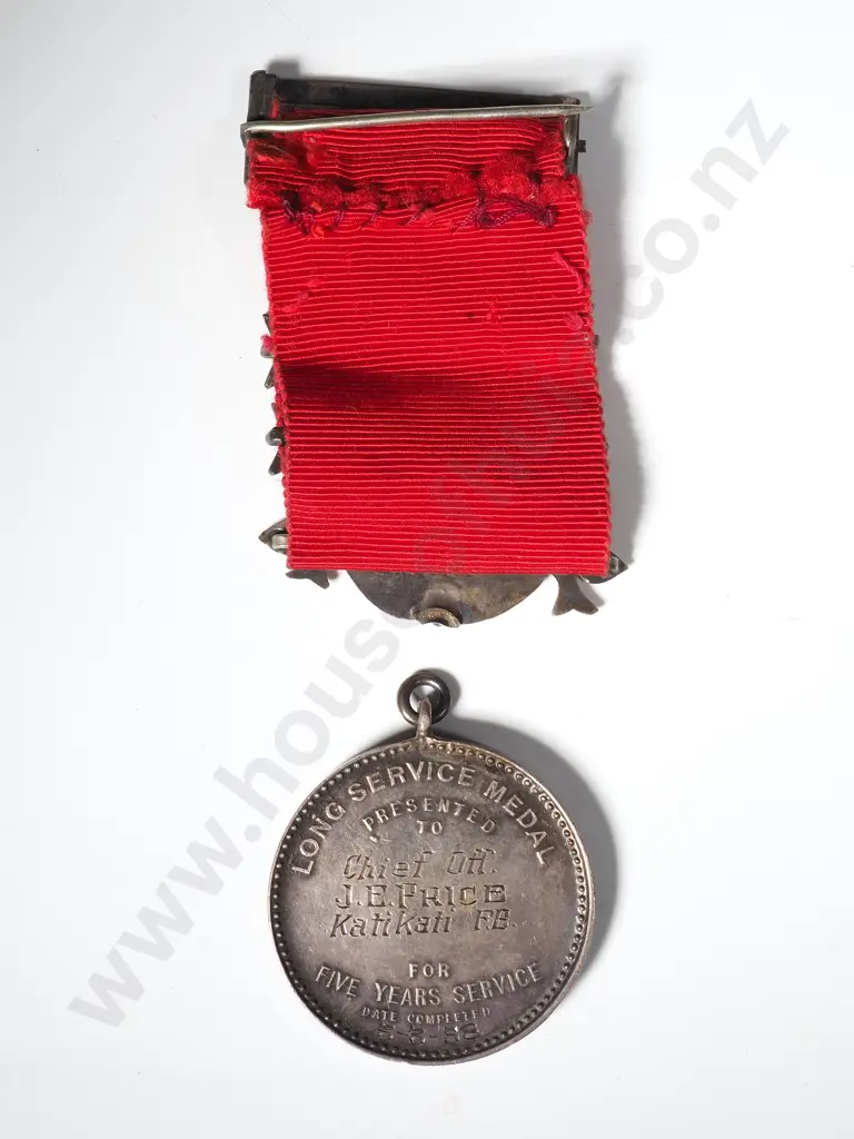 Long Service Fire Medal to J.E. Price Image 1++