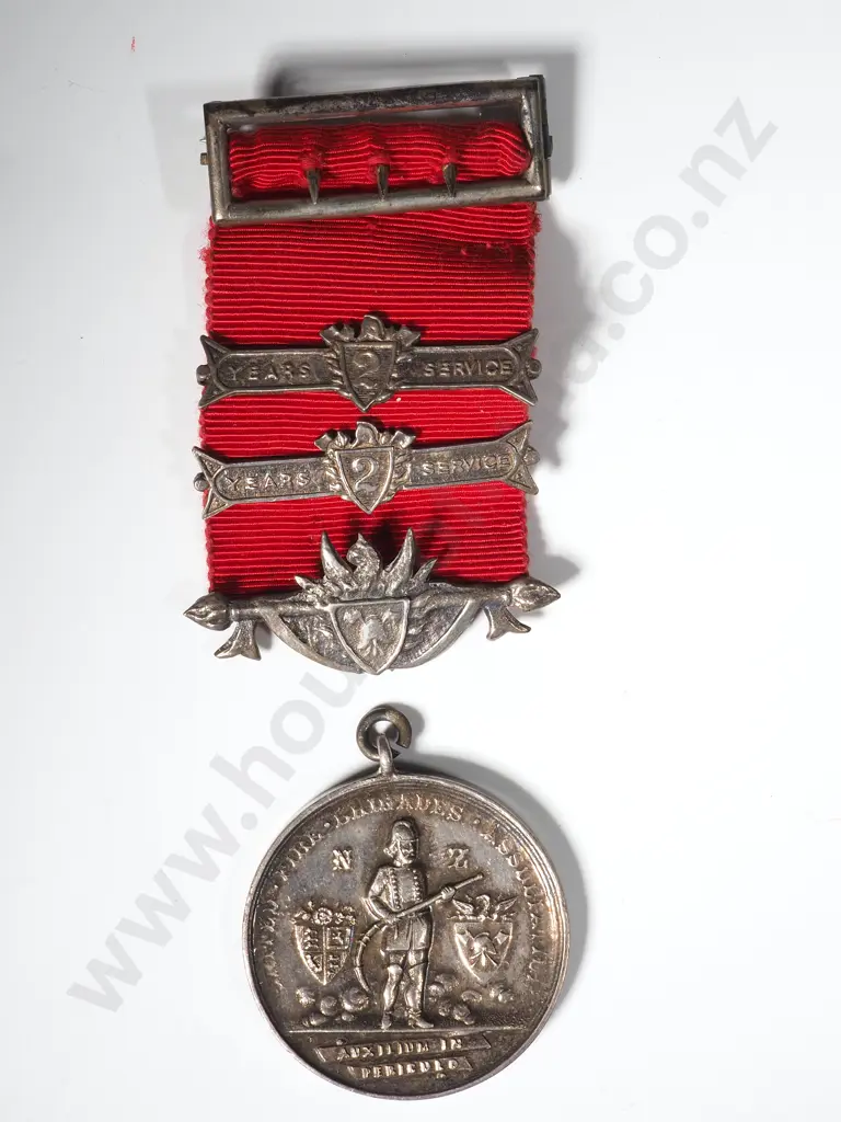 Long Service Fire Medal to J.E. Price Image 1++