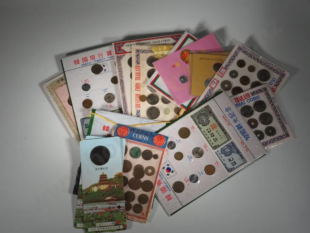 Large Lot of Oriental Uncirculated Coin Packs Image 1++