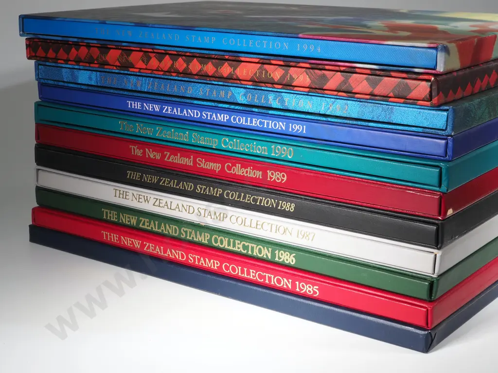 11 New Zealand Annual Stamp Albums - All Completed - $443.65 Face Value of Stamps Image 1++