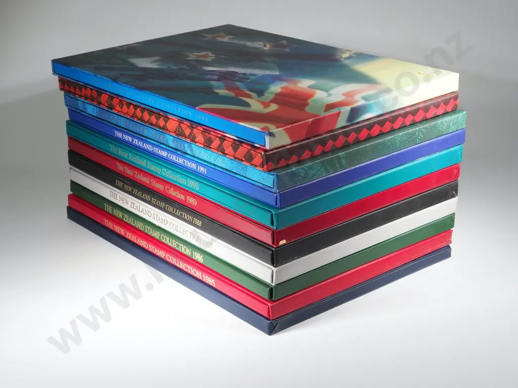 11 New Zealand Annual Stamp Albums - All Completed - $443.65 Face Value of Stamps Image 1++