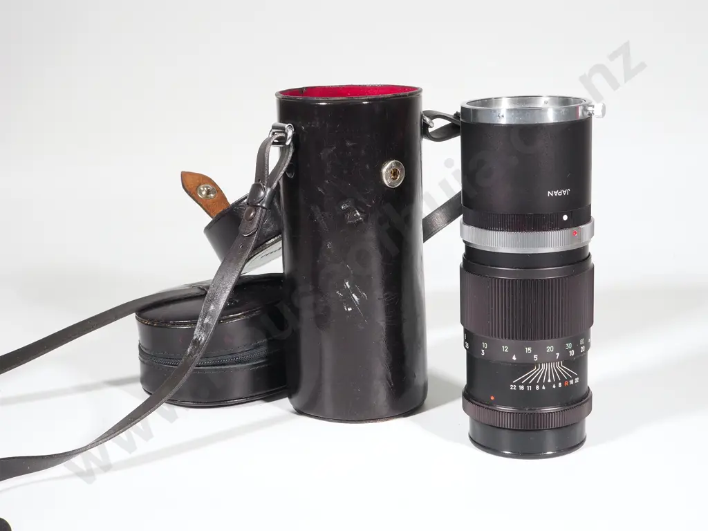 Bag Containing Vintage Minolta Camera and Lenses Image 1++