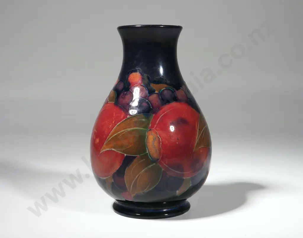 Moorcroft Vase in the Pomegranate Pattern. Repair to Rim. Green Signature. Hgt 125mm Image 1++