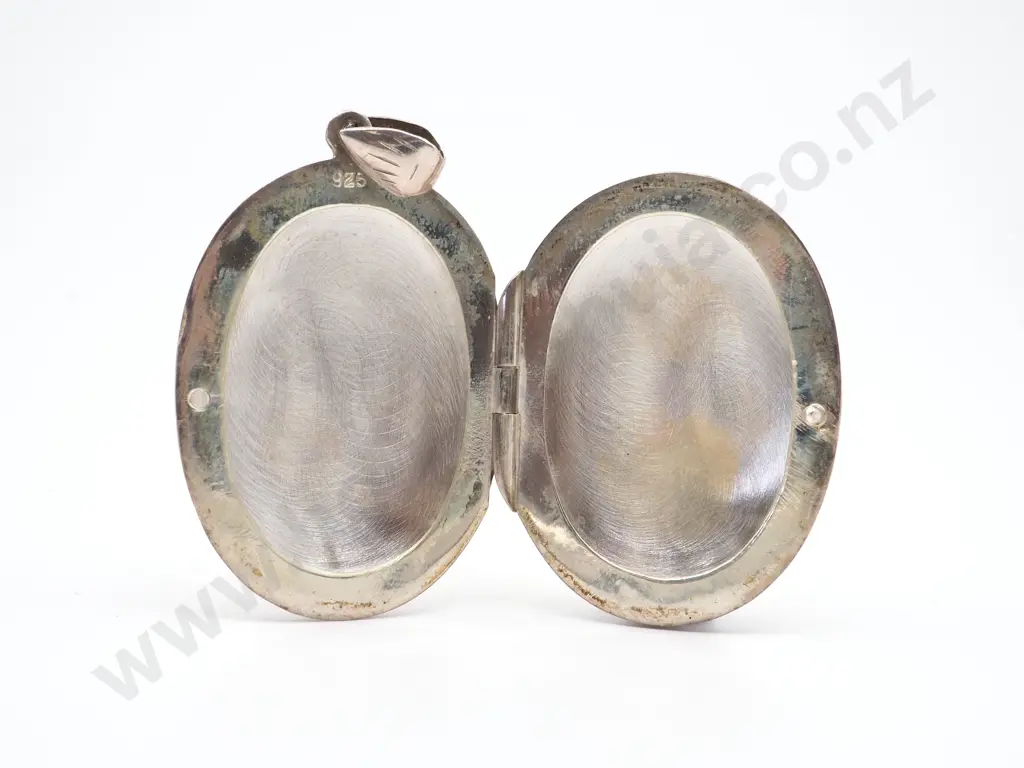 Oval Sterling Silver Locket with Allover Engraved Decoration Image 1++