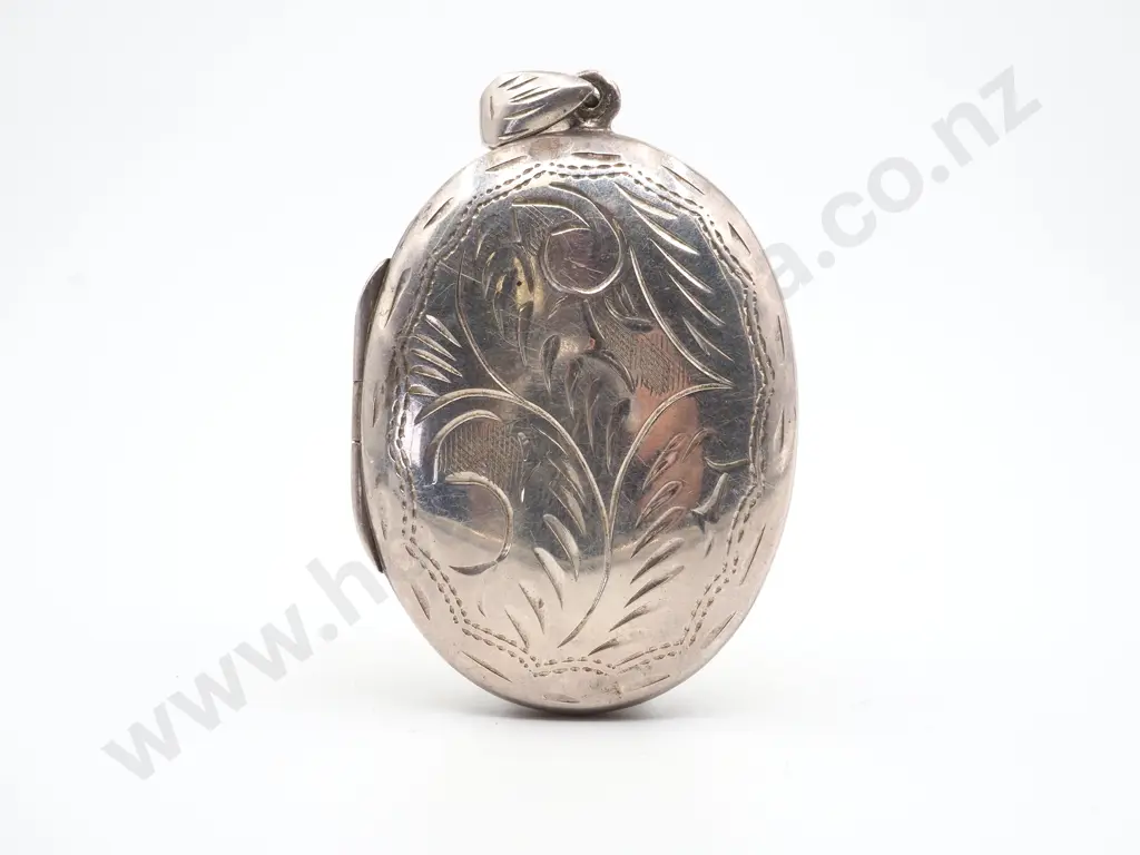 Oval Sterling Silver Locket with Allover Engraved Decoration Image 1++