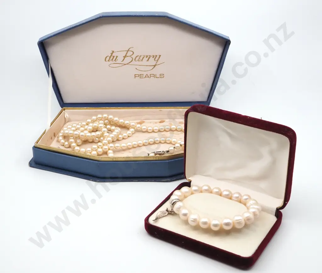 Box Containing Du Barry Pearls & a Pearl Bracelet with a Silver Angel Wing Charm  Image 1++