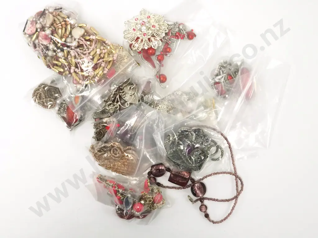 Large Bag of Costume Jewellery Containing Beads, Pendants and Brooches Image 1++