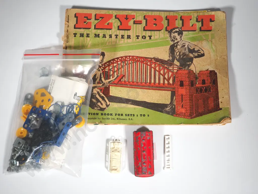 Ezy-Built Manual, Pocket Meccano Parts; Die Cast Petrol Tanker w/out Cab; Two Fire Truck Ladders; Person on Stretcher Image 1++
