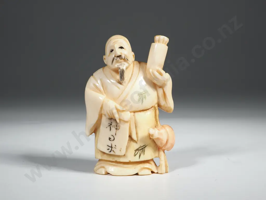 Ivory Netsuke Of An Old Man With A Scroll  Image 1++