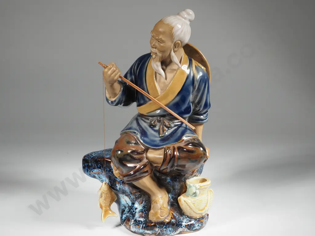 Vintage Chinese Shiwan Pottery Mudman Figurine Depicting A Seated Fisherman with A Rod Image 1++
