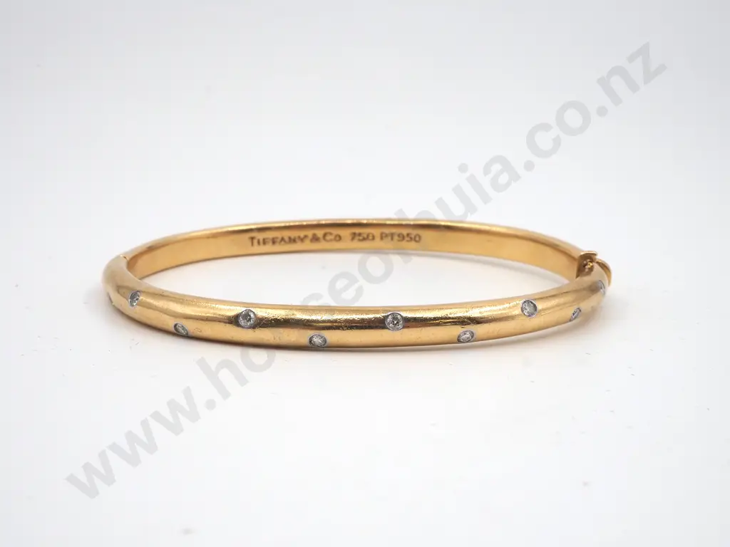 18ct Gold & Diamond Tiffany Hinged Bangle Image 1++