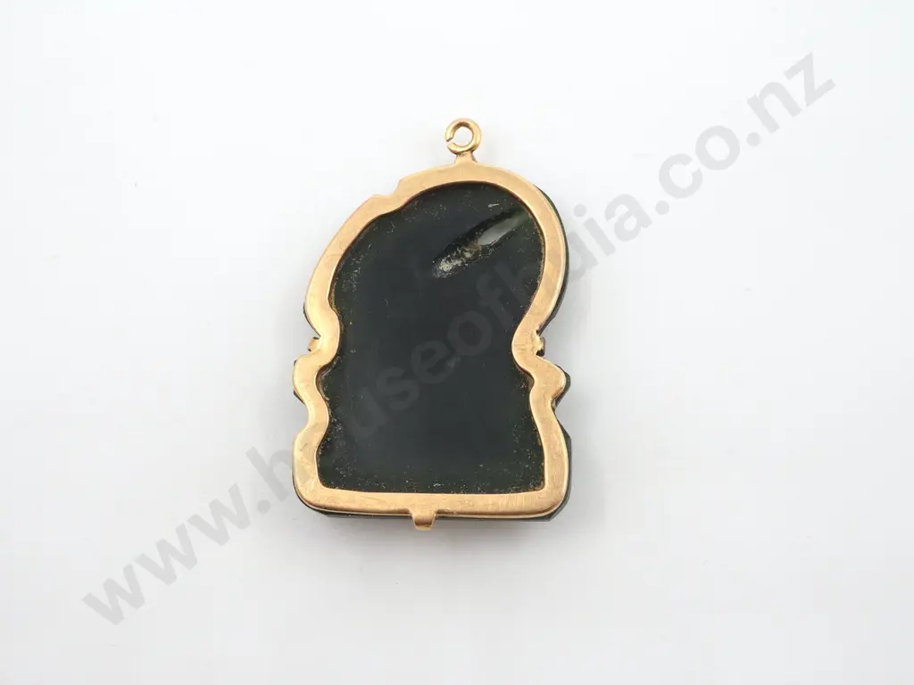 Stylized Greenstone Tiki On A Gold Backing. Image 1++