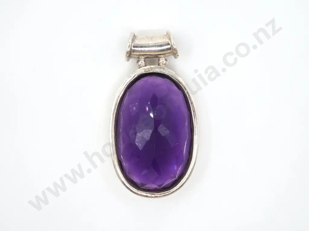 Amethyst Coloured Pendant In Sterling Silver Mount Image 1++