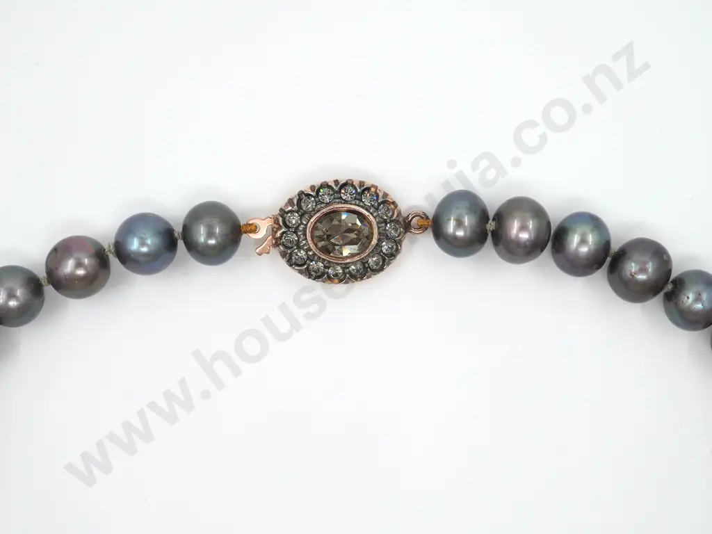 String Of Black Pearls with An Oval  Decorative Stone Clasp  Image 1++