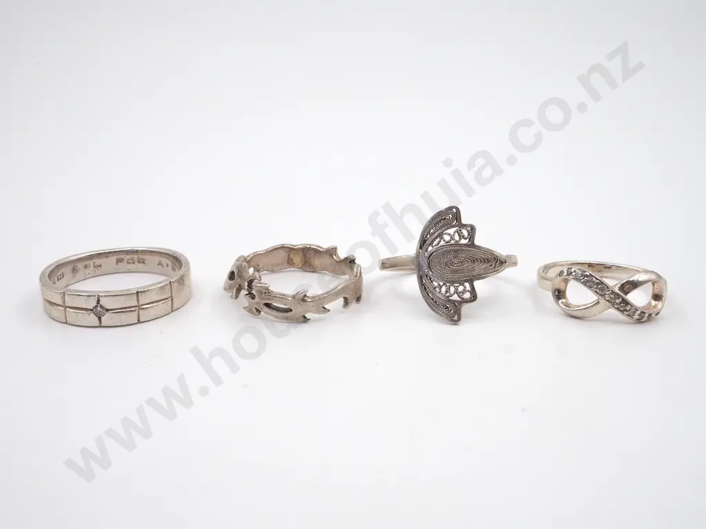 Four Sterling Silver Rings Image 1++