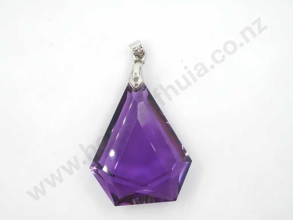 Shaped Amethyst Coloured Pendant with Silver Bale  Image 1++