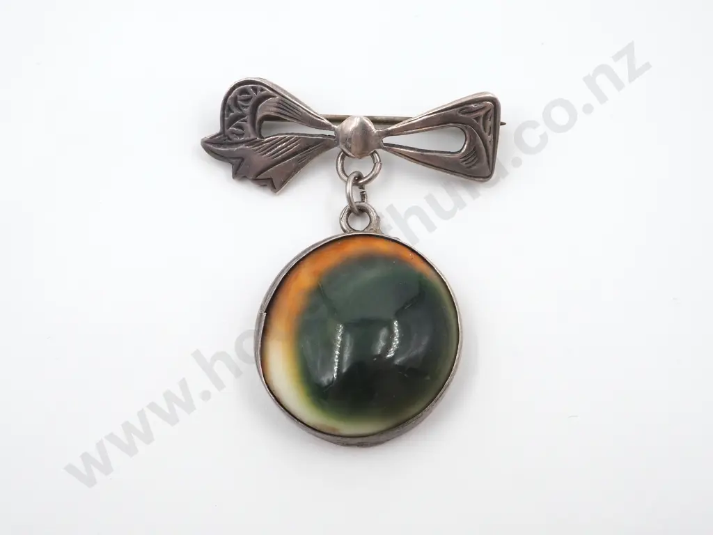 Sterling Silver Cat's Eye Brooch Suspended from a Sterling Bow  Image 1++