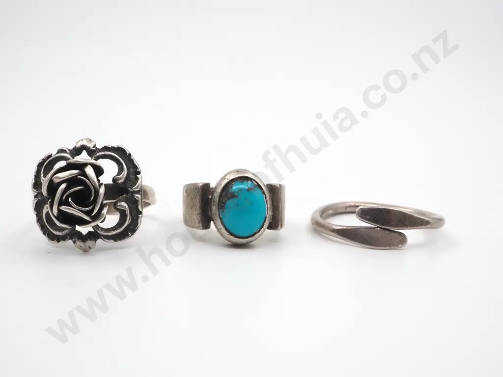 Three Sterling Silver Rings. One with a Turquoise Stone Image 1++