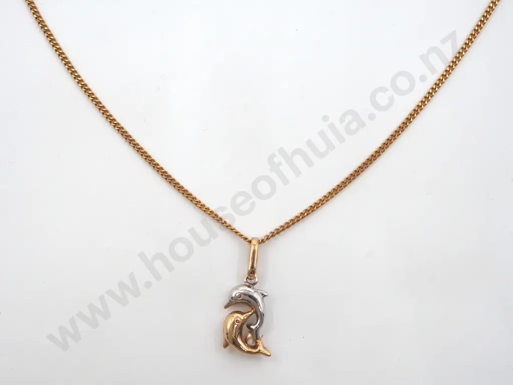 9ct Gold Chain & Pendant. The Pendant Depicting Two Intertwined Dolphins in White & Yellow Gold  & Inset with a Diamond Image 1++
