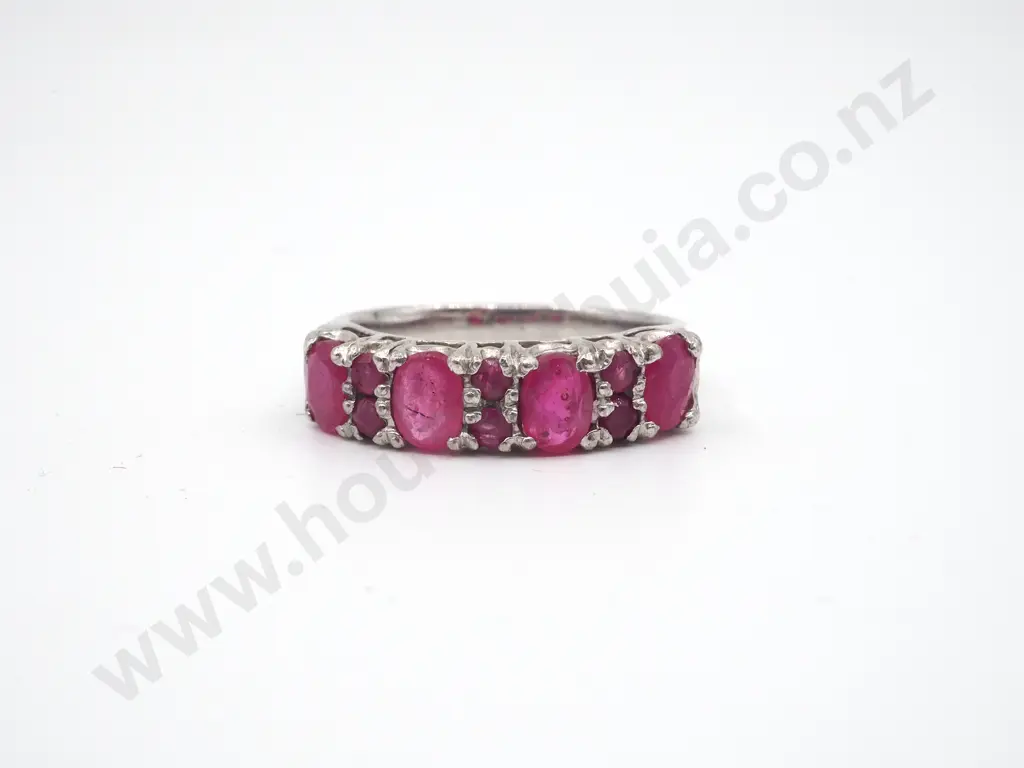 Sterling Silver Ring w Four large Pink Gems Separated by Smaller Gems. Image 1++