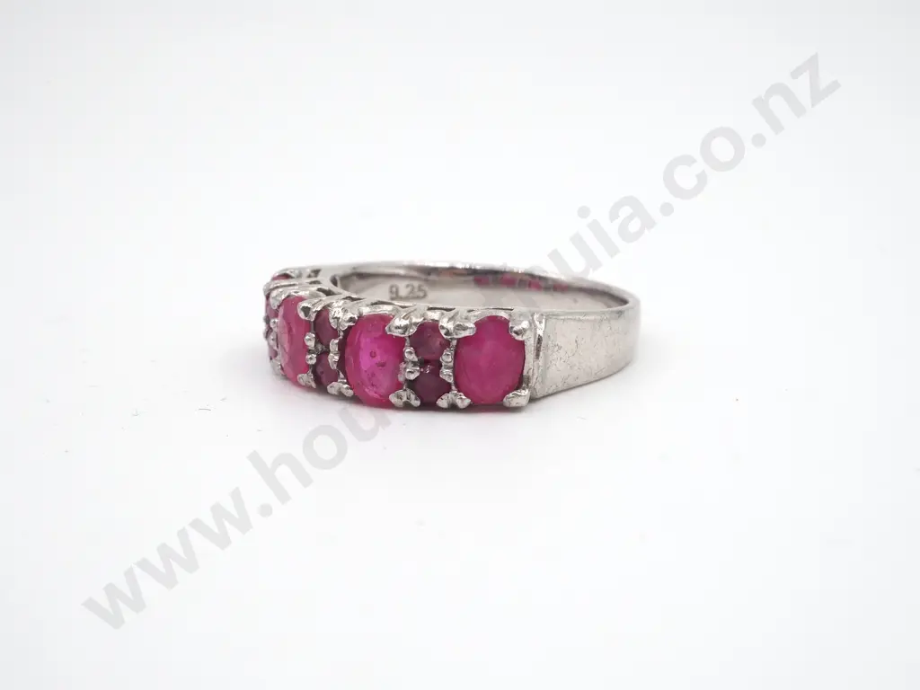 Sterling Silver Ring w Four large Pink Gems Separated by Smaller Gems. Image 1++