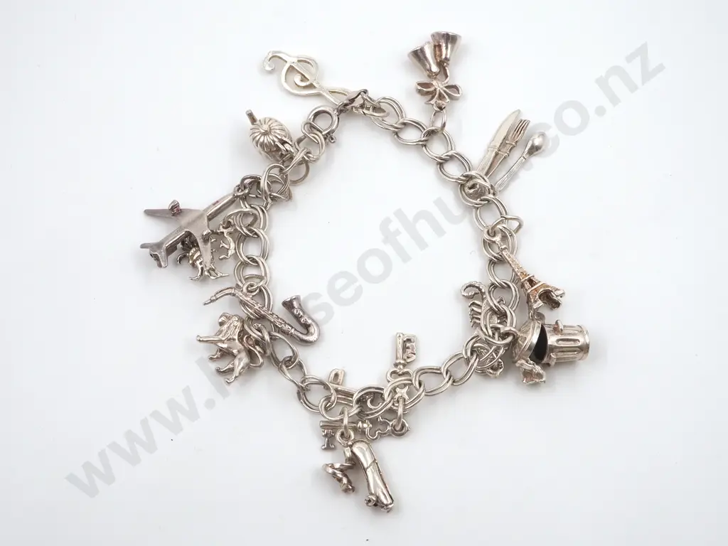 Sterling Silver Charm Bracelet Weight 24.14 grams Image 1++
