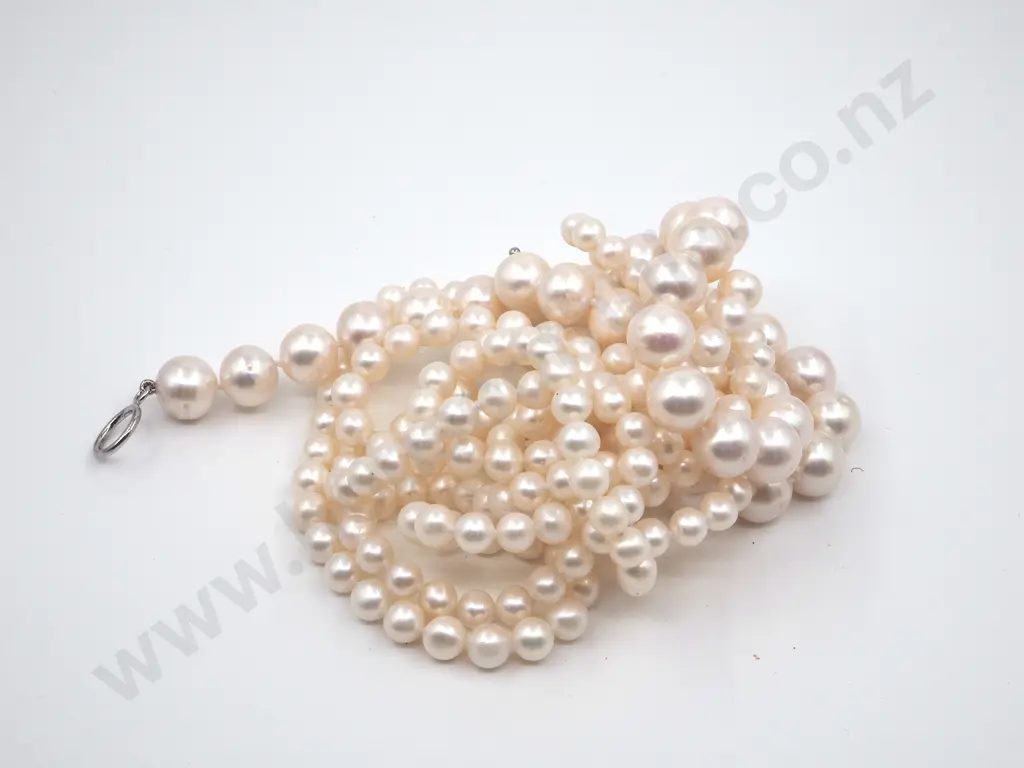 Bag Containing Two String Of Hand Knotted Pearls  Image 1++