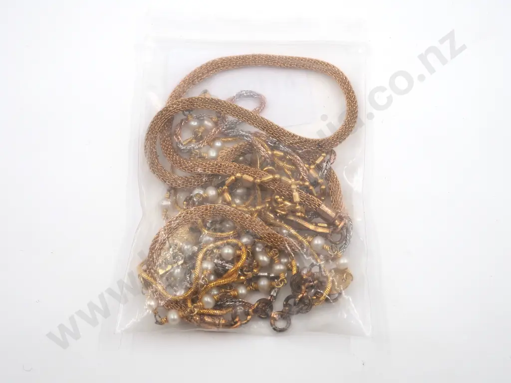 Five Gold Coloured Fine Necklaces. One Set With Pearls  Image 1++