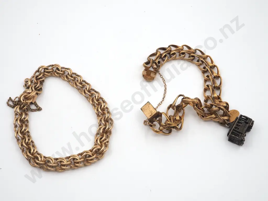 Two Fancy Link Gold Coloured Bracelets.One With A Charm  Image 1++
