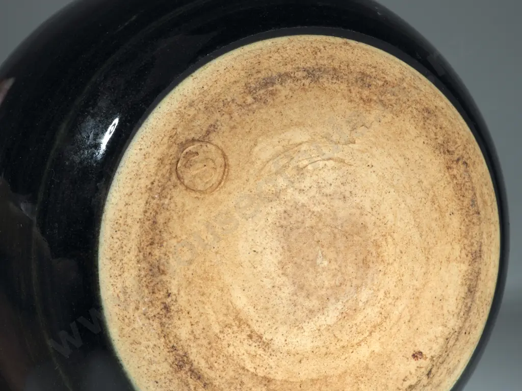 Bulbous Pottery Vase w Black Ground &  Stylized Daisy Pattern. Marked With An S In A Circle. Image 1++