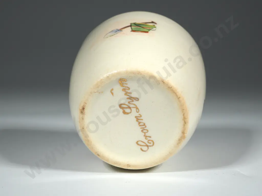 Crown Lynn Egg Cup. White Ground with Bucket & Spade, Ball & Skipping Rope, Yacht. Gold Lettering Crown Lynn Image 1++